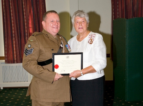 Colour Serjeant Stephen Smith with Dame Janet Trotter DBE after being presented with the Lord-Lieutenant’s Certificate of Meritorious Service.