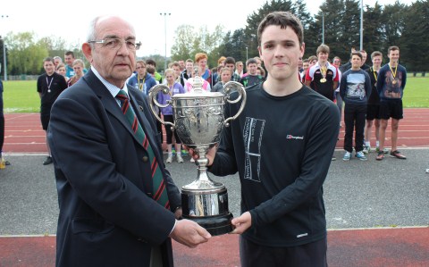 Army Cadet CSM Daniel Rowe receiving an Athletics Trophy