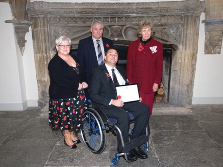 George Pas with Lord-Lieutenant Lady Gass and his Certificate for Meritorious Service