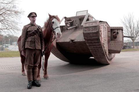 Trooper Kieran Sherring with ‘warhorse’ Adam and an original First World War tank. Picture courtesy of the Tank Museum.