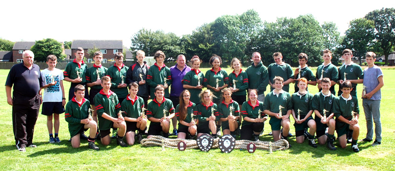 The Victorious South West Army Cadets proudly display their trophies with their coaching staff and the 2 loaned Somerset pullers.